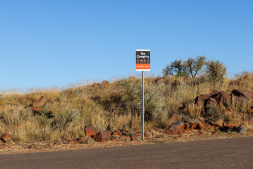 No camping sign at parking bay at Reader Head out of Cossack in the Pilbara - Australian Stock Image
