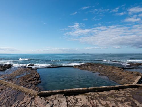 Ocean baths adjacent the surf - Australian Stock Image
