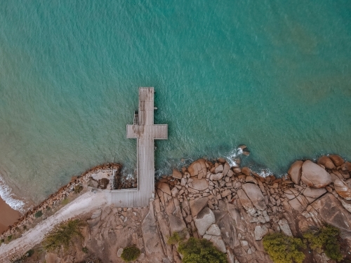 Ocean rocks and jetty from above - Australian Stock Image