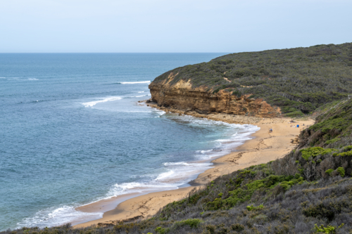 ocean water sand and cliff at Bells Beach - Australian Stock Image