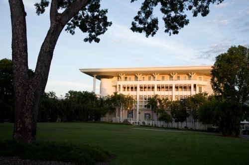 Official building in Darwin city with lush gardens - Australian Stock Image
