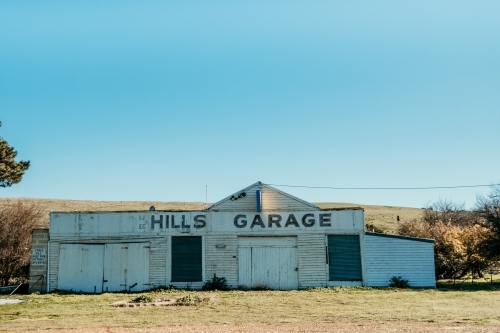 Old abandoned historic garage in the country.