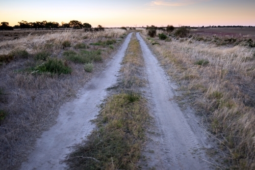 Old dirt road at the end of the day - Australian Stock Image