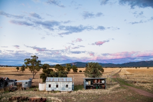 Old farm sheds in the evening light - Australian Stock Image