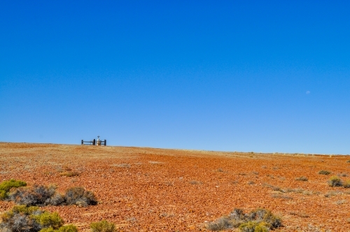 Old grave on a hill in the desert - Australian Stock Image