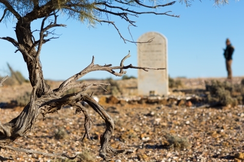 Old headstone in abandoned cemetery - Australian Stock Image