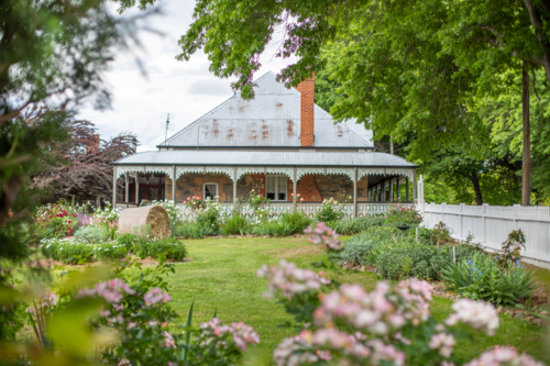 Old historic cottage and country garden - Australian Stock Image