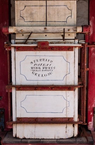Old historic wool press in a pioneer museum - Australian Stock Image
