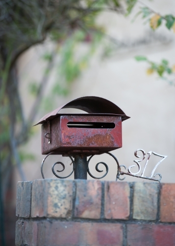 Old letterbox and house number