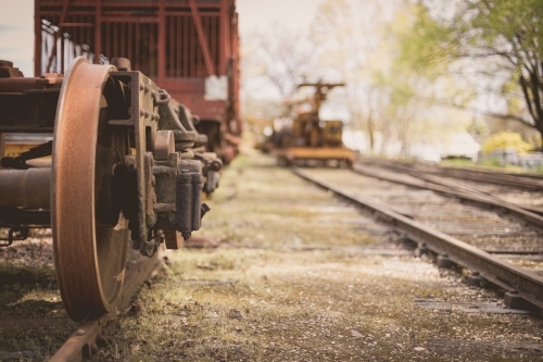 Old rusted cargo train carriage in country railyard - Australian Stock Image