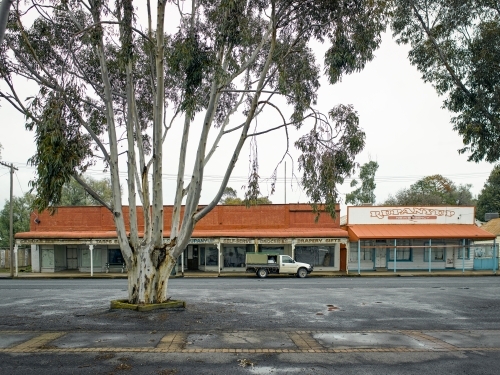 Old shops on a wide street in a country town - Australian Stock Image