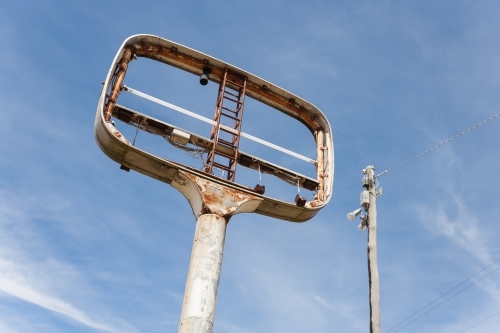 Old signage at an abandoned petrol station - Australian Stock Image