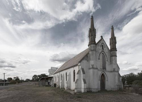 old weathered church in rural town - Australian Stock Image