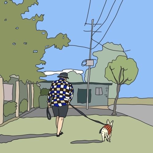 Older woman taking little dog for walk on crisp winter morning - Australian Stock Image
