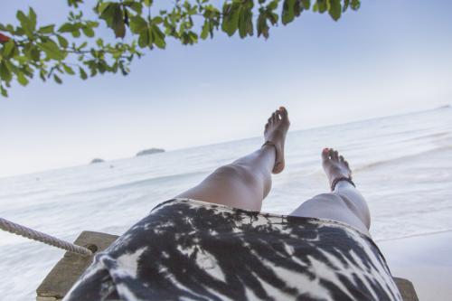 On a Swing by the Beach - Australian Stock Image