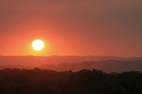 Orange sunset over hills - Australian Stock Image