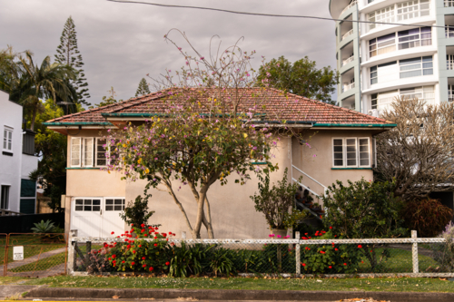 Original Art Deco house in Redcliffe next to a unit block - Australian Stock Image