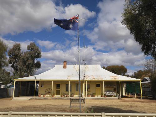 Outback homestead with Australian flag