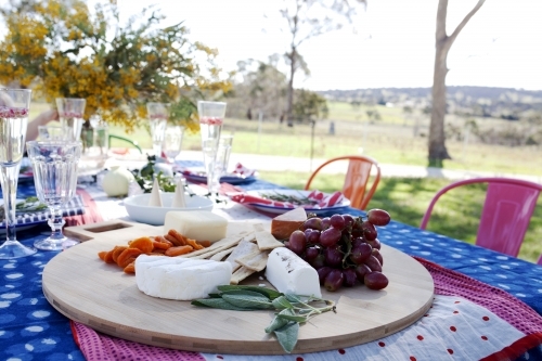 Outdoor table setting ready for Christmas celebration - Australian Stock Image