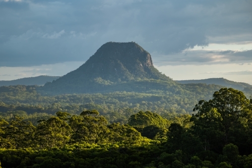 Overcast landscape with mountain in the Glass House Mountains - Australian Stock Image
