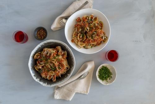 Overhead of rustic mussel dish presented on bench - Australian Stock Image