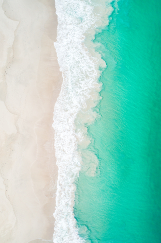 Overhead of tropical turquoise white sandy beach - Australian Stock Image