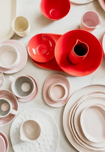 Overhead shot of homewares spread out on tabletop. - Australian Stock Image