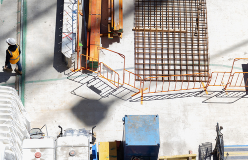 Overhead view of a construction site with construction worker - Australian Stock Image