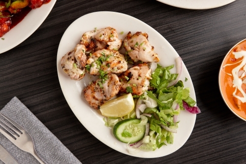 Overhead view of Indian dish on table - Australian Stock Image