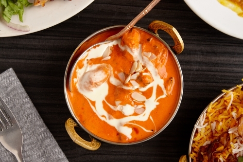 Overhead view of Indian dish on table - Australian Stock Image