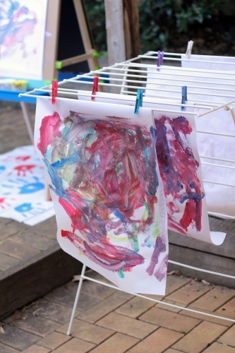 Painted artwork hanging up to dry - Australian Stock Image