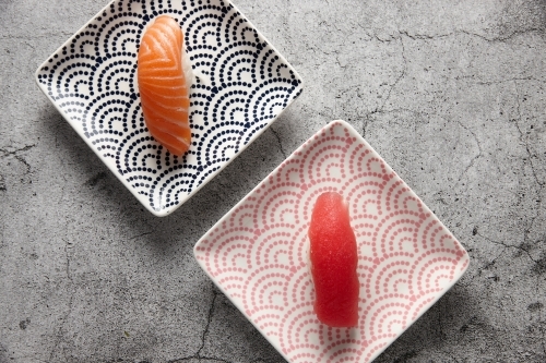 Pair of nigiri on square plates - Australian Stock Image