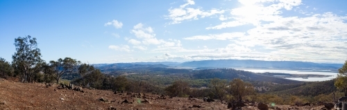 Panorama of dry stony paddock looking out over Lake Burrendong - Australian Stock Image