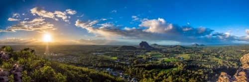 Panorama of sunrise over valley. - Australian Stock Image