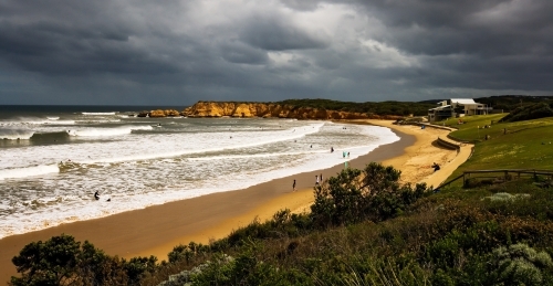 Panorama of surf beach with storm approaching