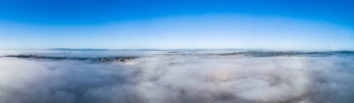 Panoramic landscape of cloud and mist covering Singleton in the early morning
