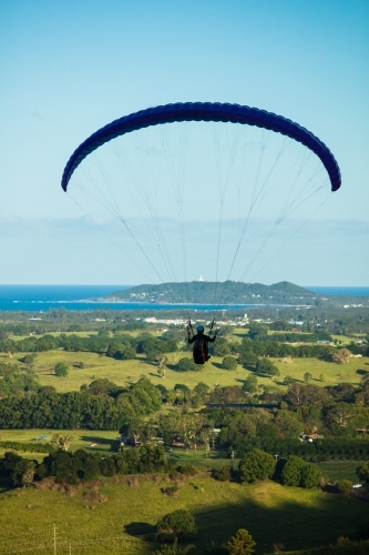Paragliding above the hinterland near Byron Bay in the Northern Rivers. - Australian Stock Image