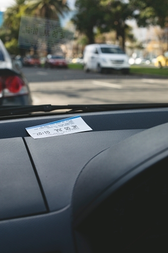 Parking ticket placed on car dashboard in Melbourne inner city