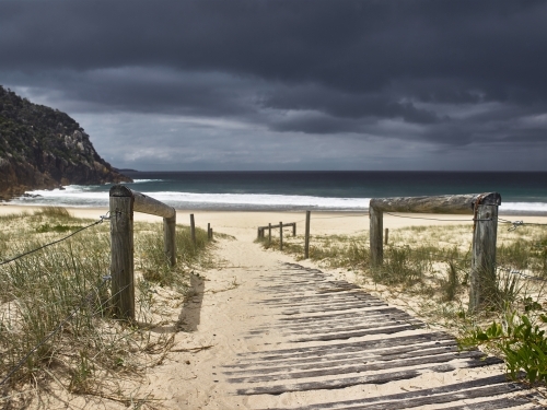 Path to beach with an approaching storm - Australian Stock Image