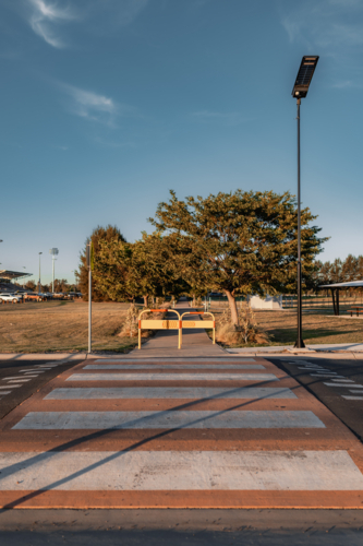 Pedestrian Crossing over road in community sports complex - Australian Stock Image