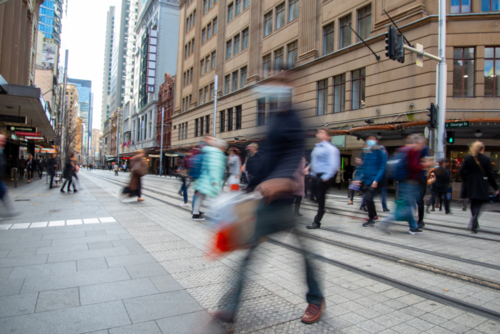 Pedestrians crossing George Street light rail tracks - Australian Stock Image
