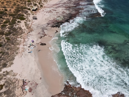 People enjoying the beach in Kalbarri on a hot summer day - Australian Stock Image