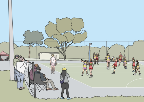 People sitting and standing on sidelines watching winter netball game - Australian Stock Image