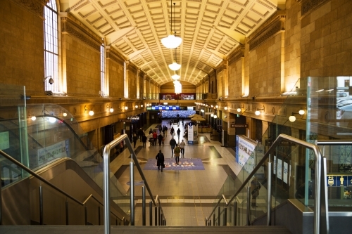 People walking through railway station - horizontal - Australian Stock Image