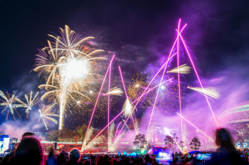 People watching fireworks on Australia Day in Adelaide City at night time - Australian Stock Image