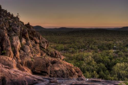People watching the sunset over Gunlom Falls Kakadu - Australian Stock Image