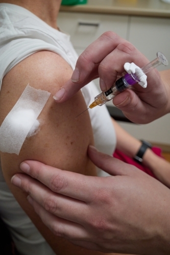 Person receiving Covid-19 vaccination