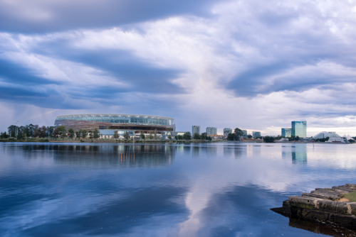 Perth Stadium Along The Swan River seen across the water on stormy day - Australian Stock Image
