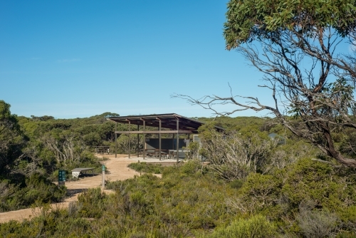 Picnic tables and shelter in bushland