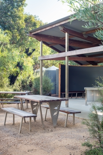 Picnic tables and shelter in bushland - Australian Stock Image